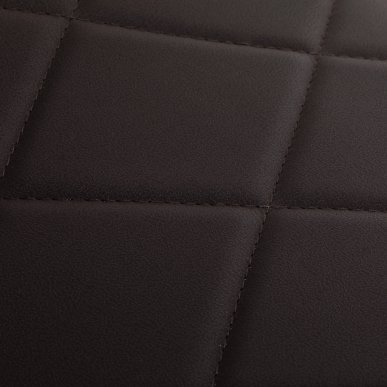 Professionele barberstoel Gabbiano Bruno bruin met zwart frame voor knippen, scheren en baardverzorging in de barbershop