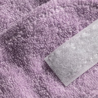Cosmetische badstof hoofdband violet met klittenband voor gezichtsverzorging en salonbehandelingen in professionele salons