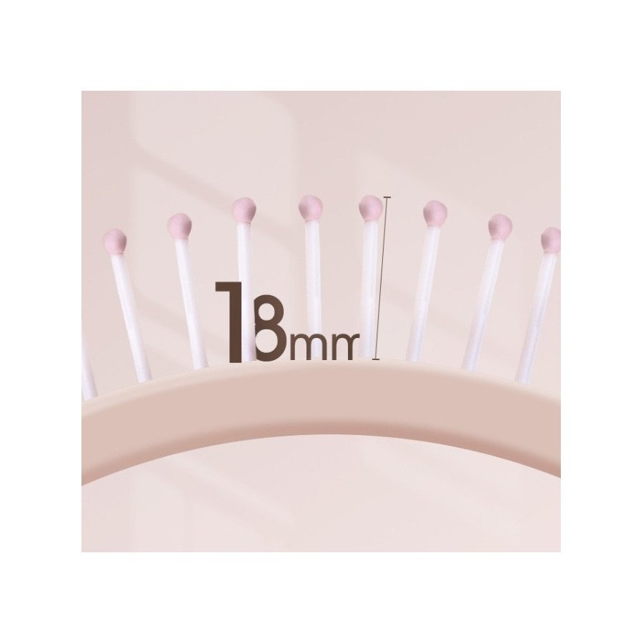 Brosse à cheveux rose poudré – effet racines, coiffage & massage