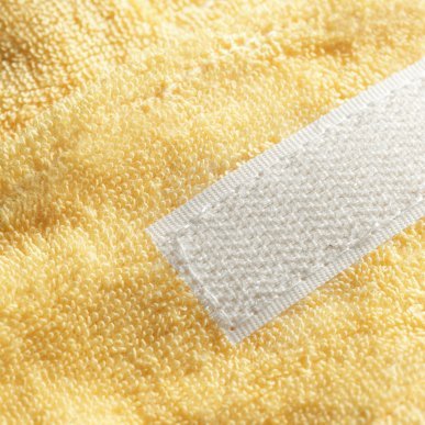 Gele badstof haarband voor schoonheidsspecialisten en professioneel gebruik in salon, praktijk of studio voor comfortabel werken